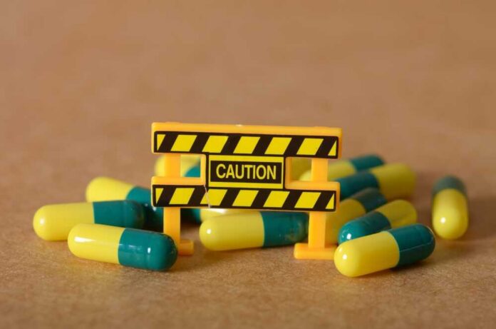 Health,Warning:,Yellow,And,Green,Capsules,With,Toy,Sign DEA website header on a computer screen