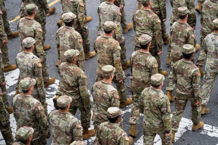 14,June,2025,,Washington,Dc,-,Us,Army,250th,Anniversary. Timmy Jernigan among soldiers marching in formation on a street