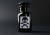 Baby Bottle Bombshell Rocks Parents Dark glass bottle with skull and crossbones label