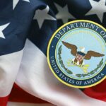 Pentagon Plans Shock Americans Department of War emblem on an American flag background