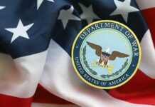 Pentagon Plans Shock Americans Department of War emblem on an American flag background